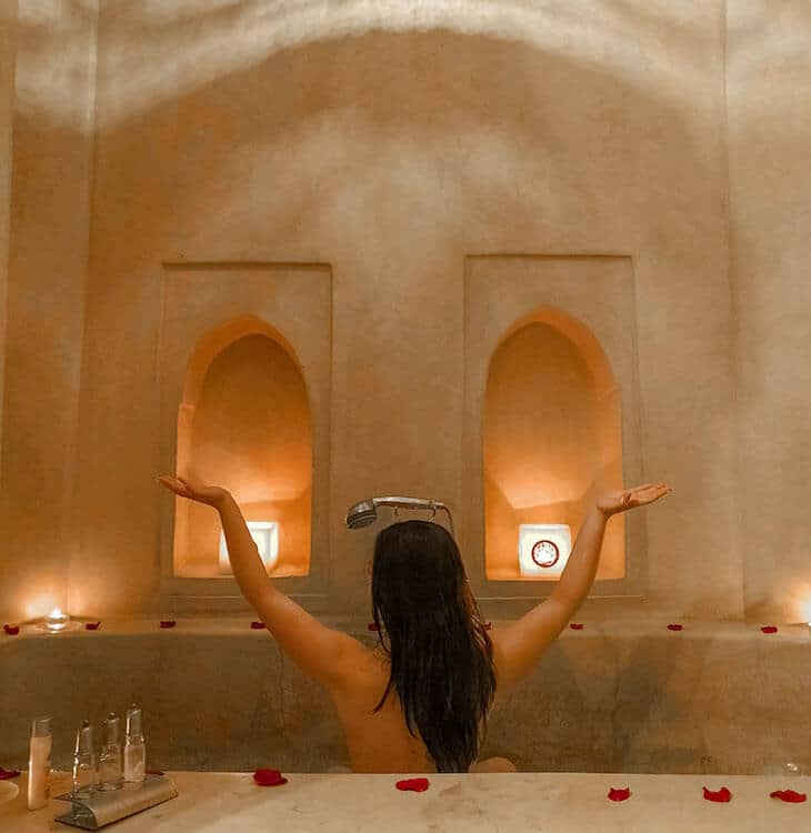 Girl posing in bathtub in Marrakech