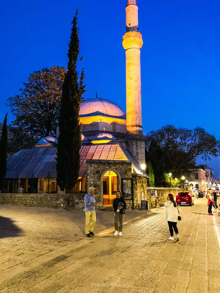 People in front of Koski Mehmed pasha mosque in Mostar