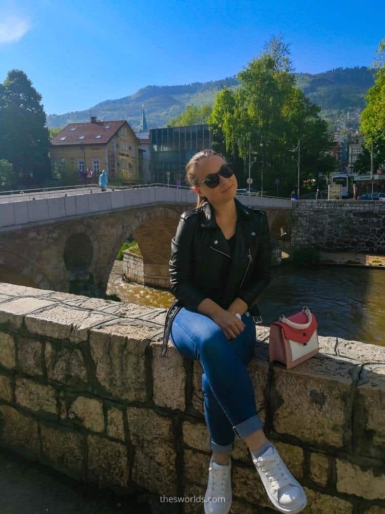 Girl sitting on Latin bridge in Sarajevo