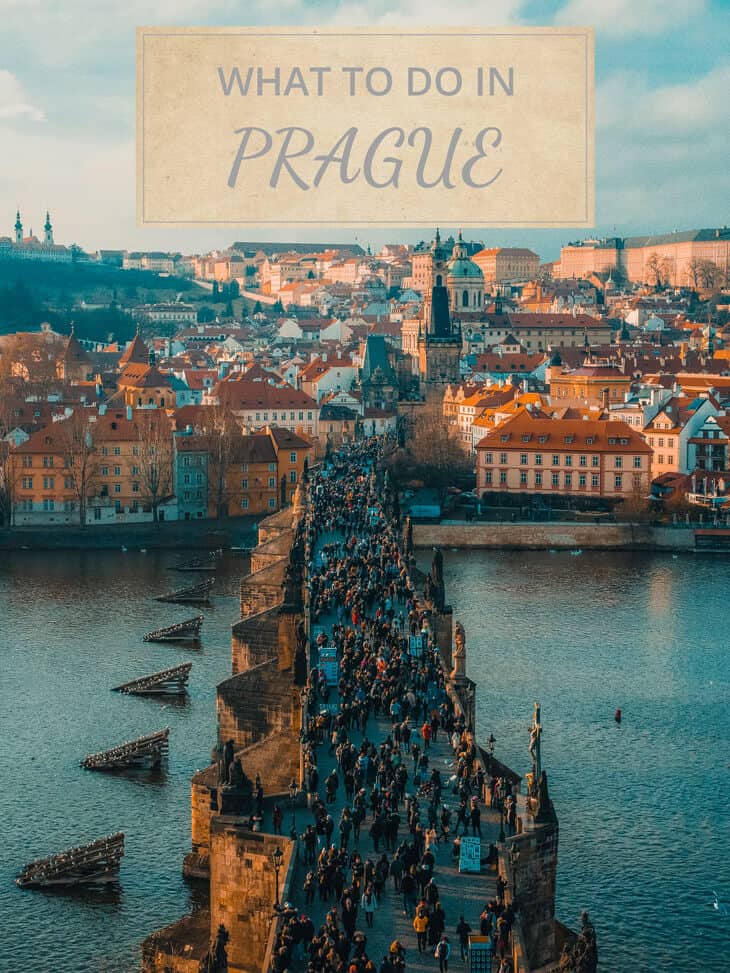 People walking on Charles bridges in Prague