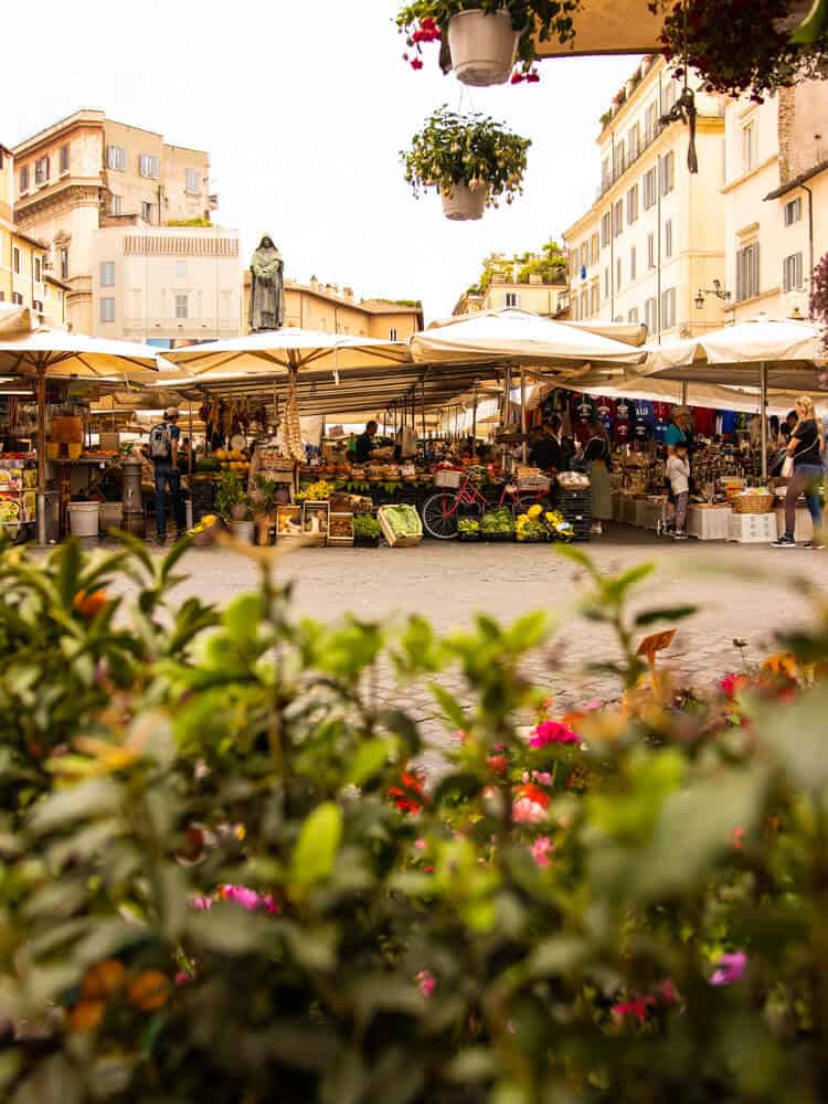 People shopping at city market in Rome