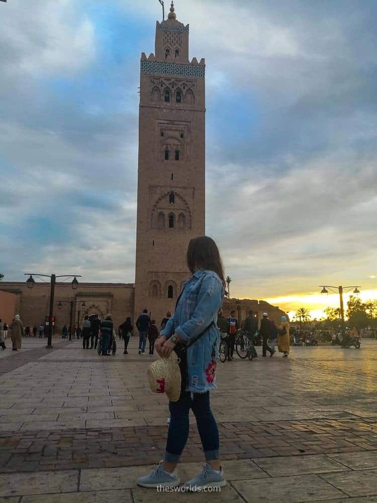 Girl posting in front of Koutoubia in Marrakech