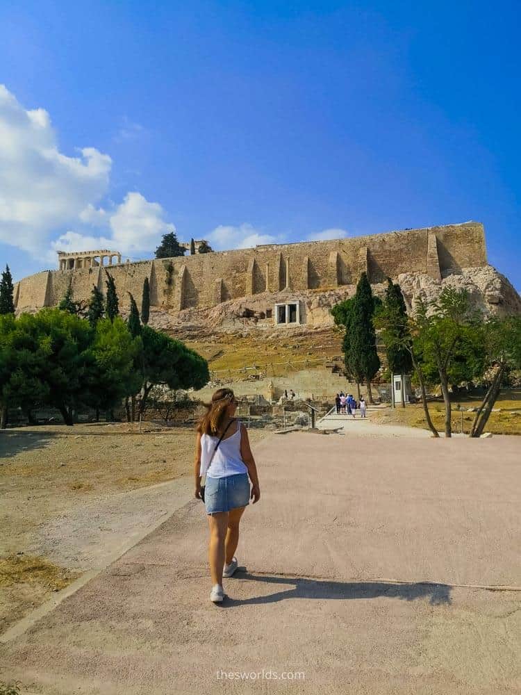 Girl walking to acropolis in Athens