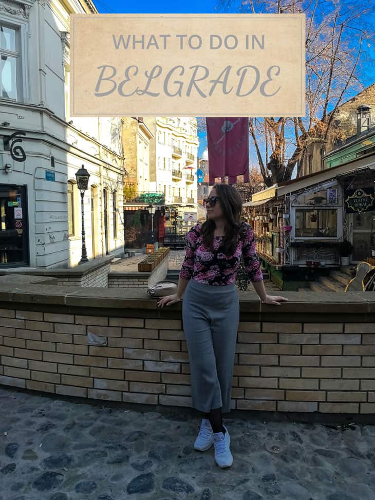 Girl standing in front of Skadarlija street in Belgrade