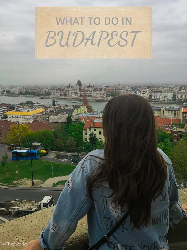 Girl looking at Budapest parliament