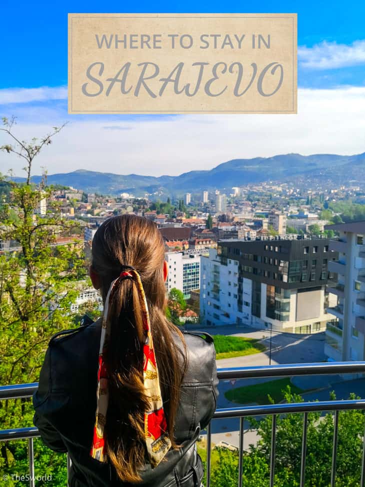 Girl looking at Sarajevo from balcony