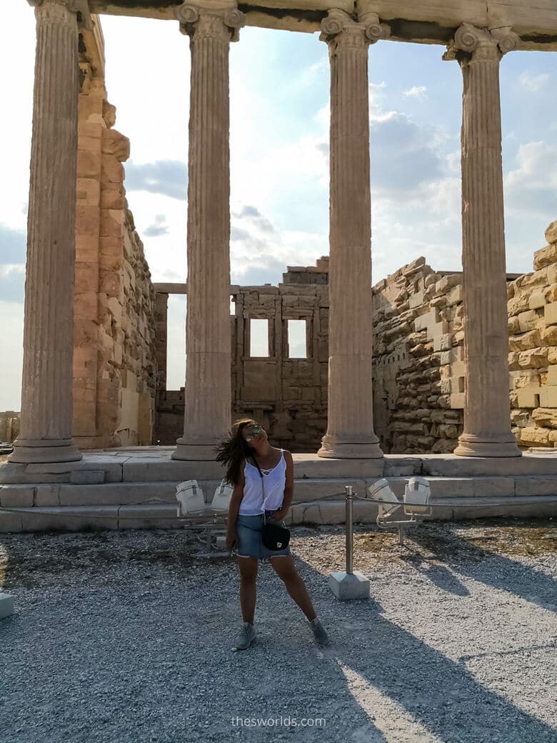 Girl posing in front of Ancient building in Athens