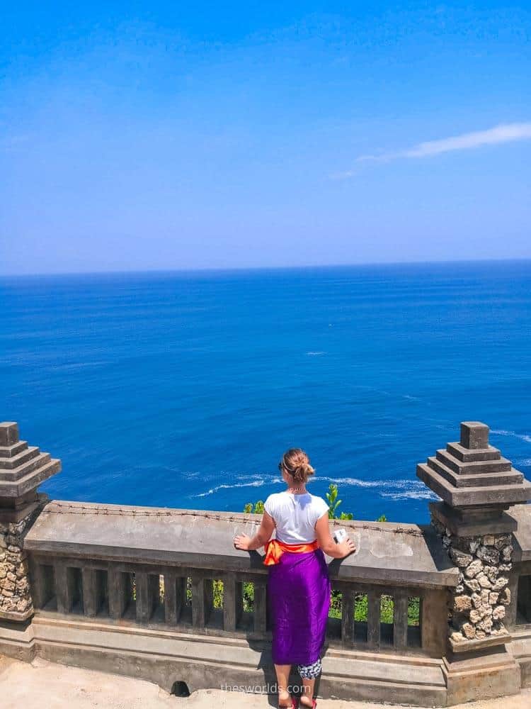 Girl looking from a cliff from Uluwatu temple in Bali