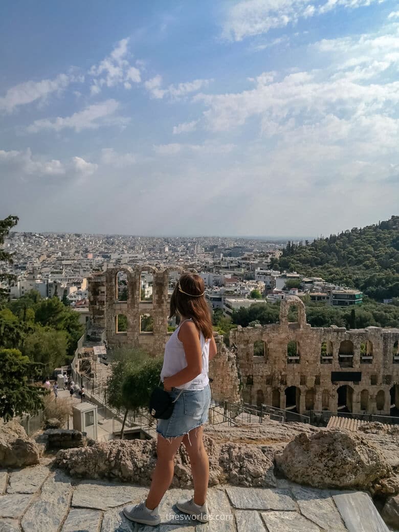 Girl looking at Athens city center from Acropolis