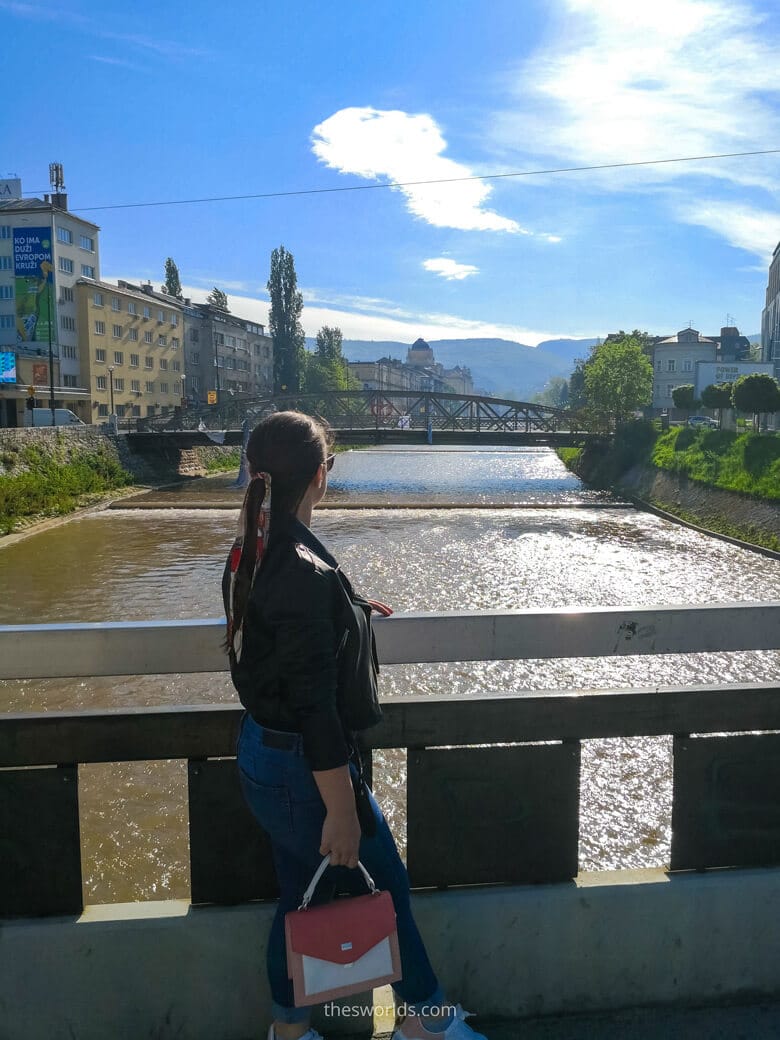 Girl looking at Skenderija Bridge in Sarajevo