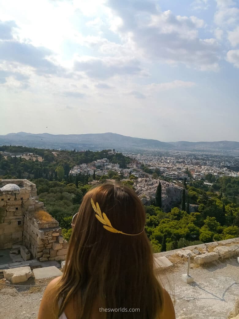 Girl overlooking Athens city center in Summer