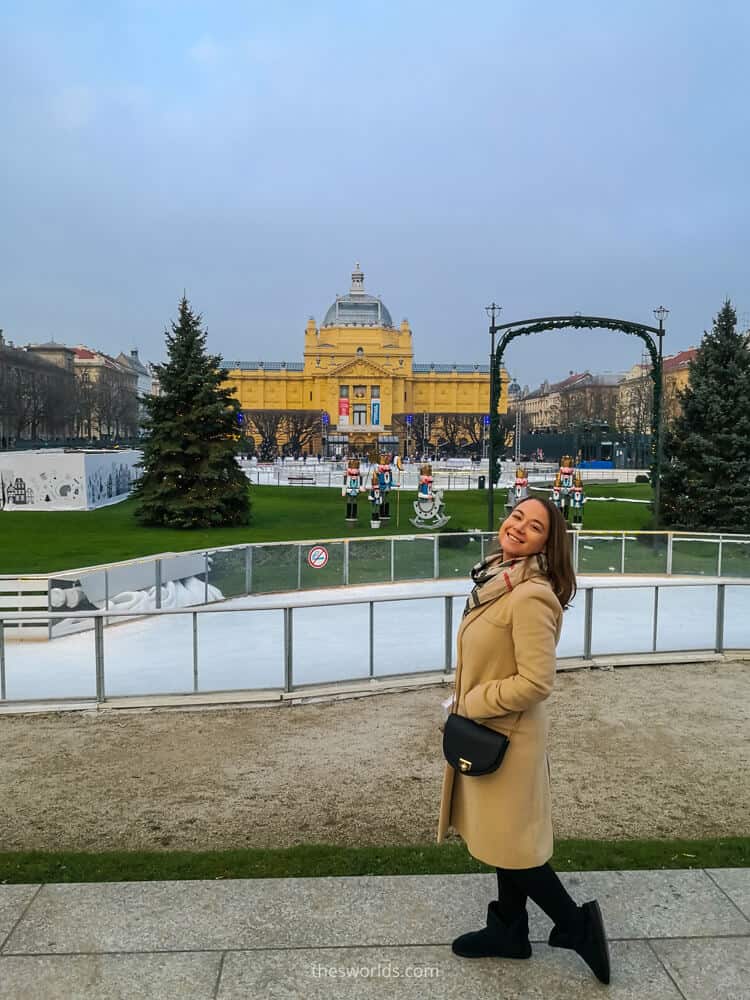 Girl posing next to ice skiing rink in Zagreb