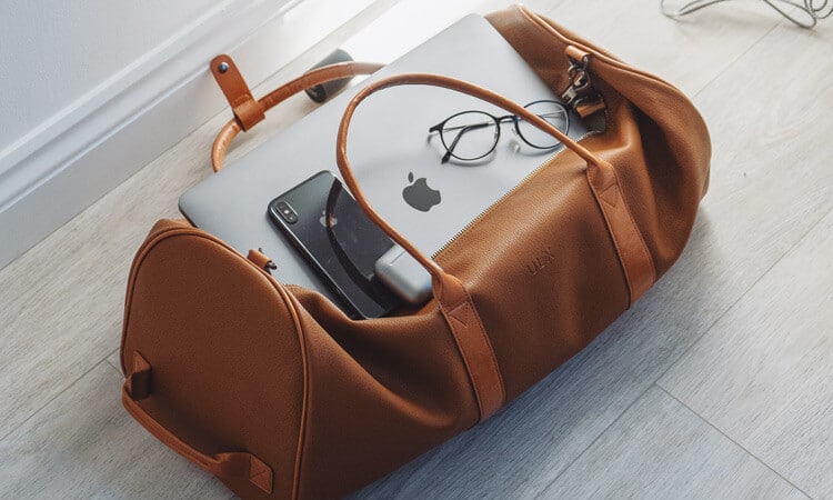 Bag with laptop and glasses