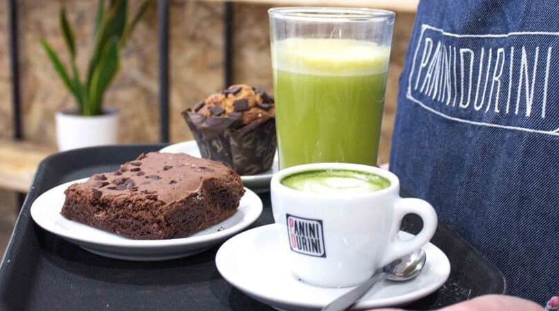Muffin and brownie with coffee and juice at Panini Durini Milan