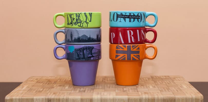 Decorated mugs with city names