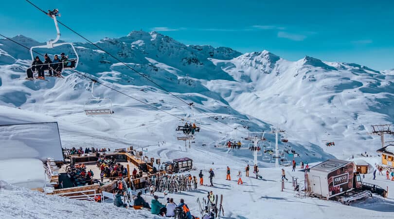 People relaxing on snow at Val Thorens, France