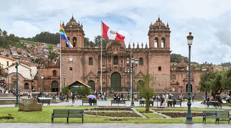 People in front of building in Cusco Peru